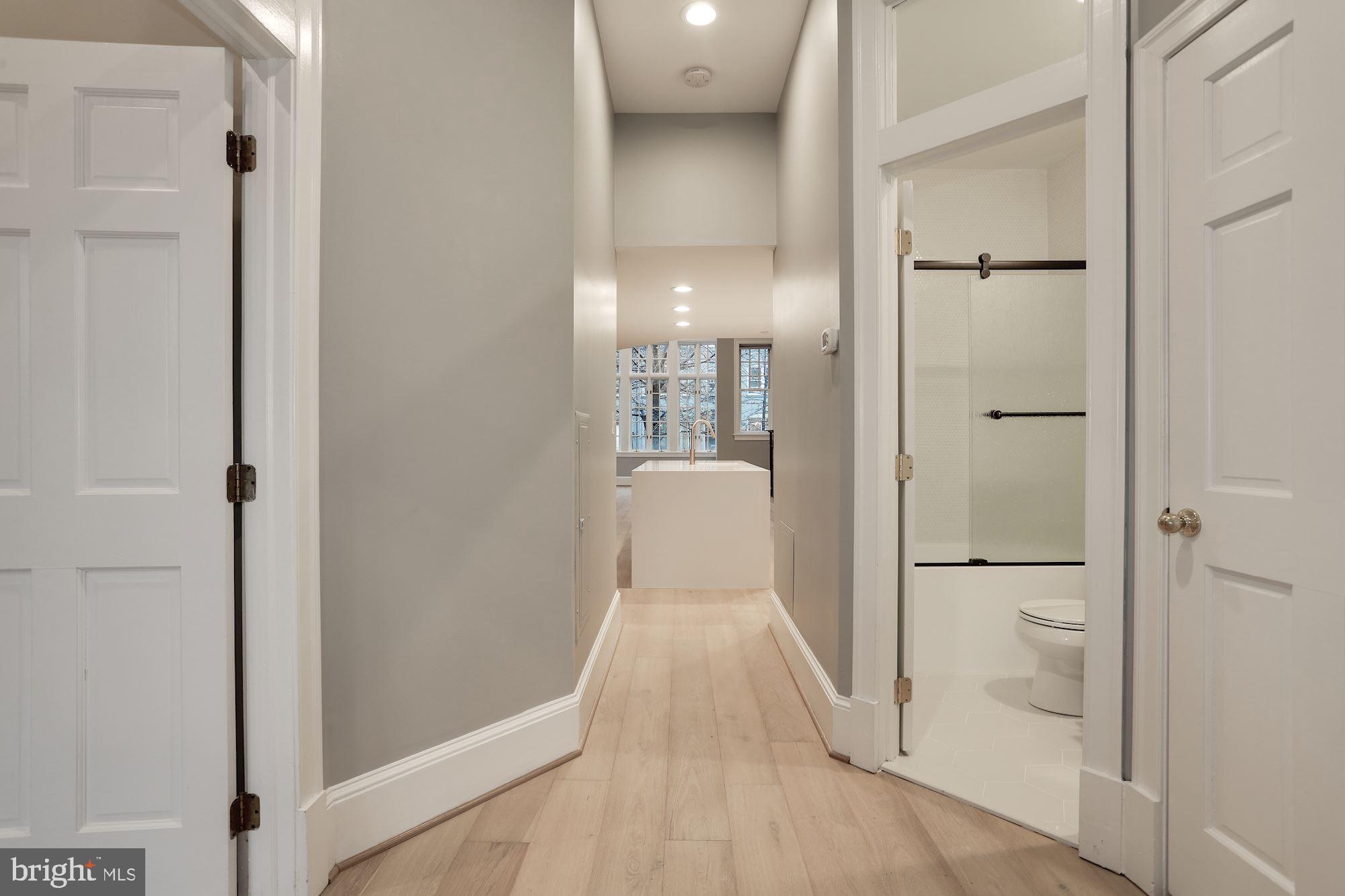 1515 P Street Northwest, Unit 2 Washington, DC 20005 - Photo 11 of 17 Striking White Oak Floors Throughout