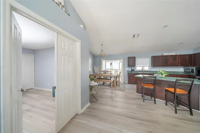 a room with lots of furniture and windows