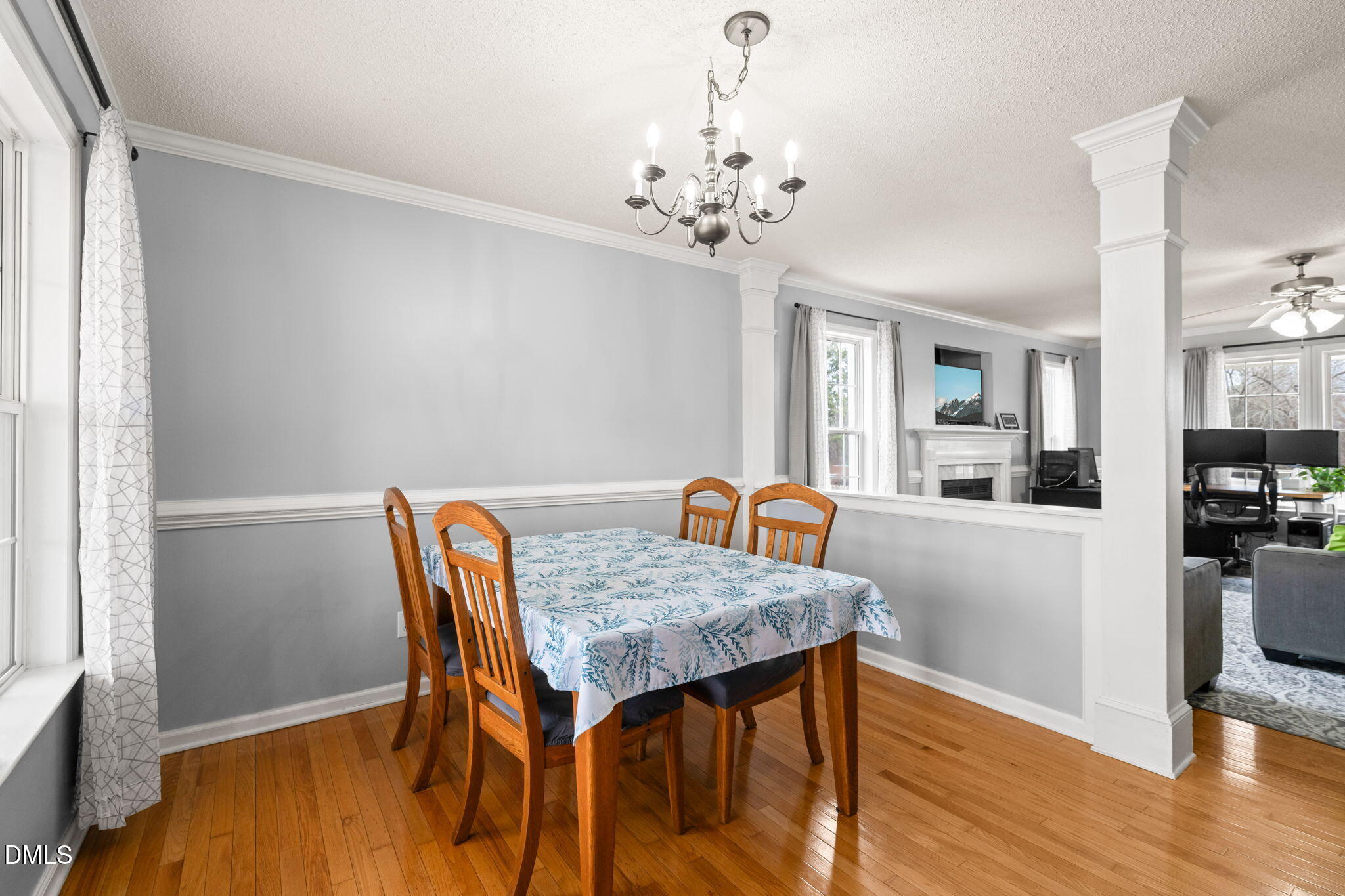 16 Saddle Ridge Drive Willow Spring, NC 27592 - Photo 13 of 57 a view of a dining room with furniture and wooden floor