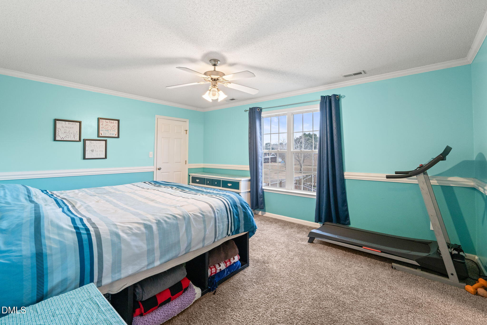 16 Saddle Ridge Drive Willow Spring, NC 27592 - Photo 23 of 57 a bedroom with a bed and a window