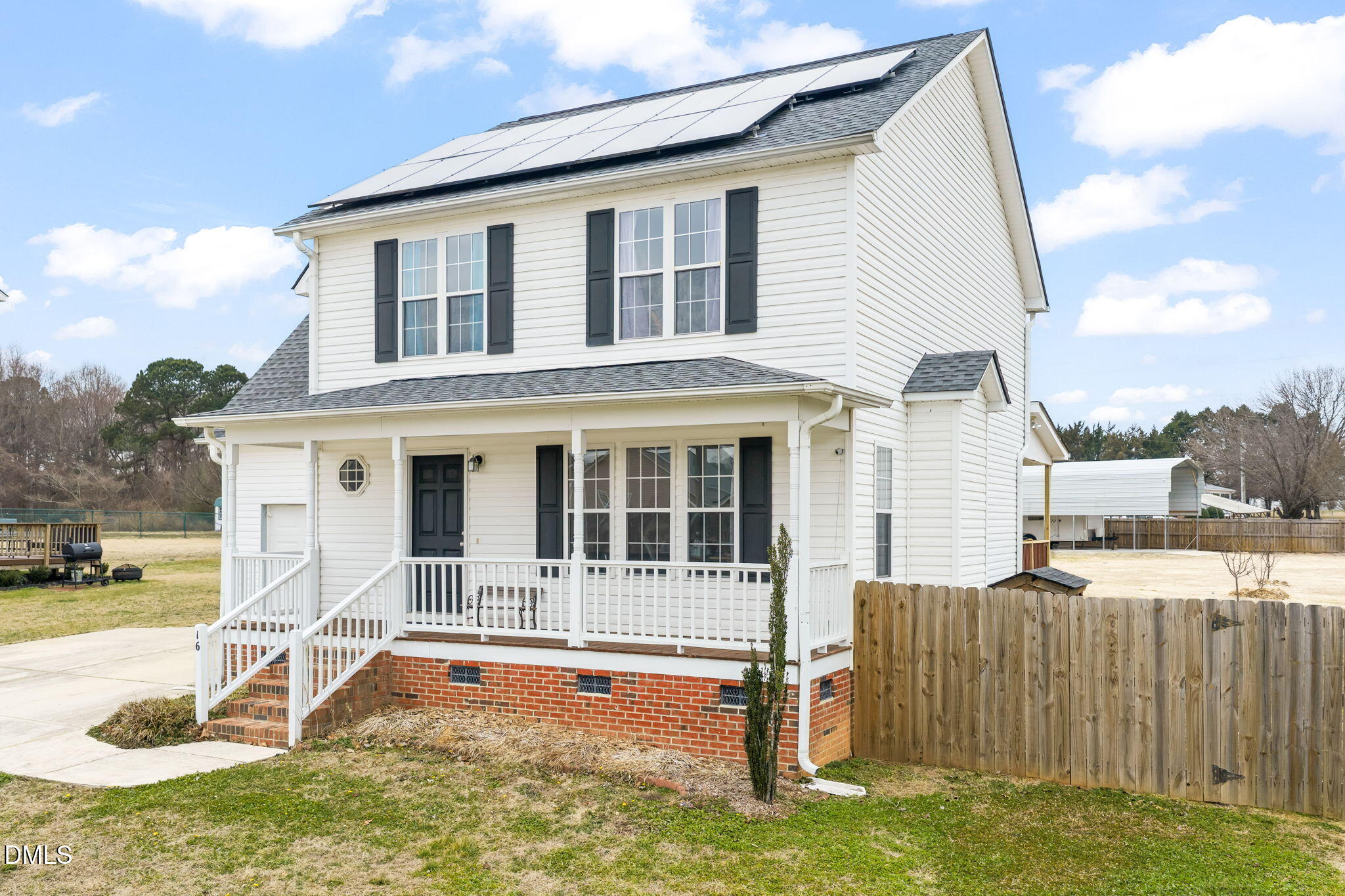 16 Saddle Ridge Drive Willow Spring, NC 27592 - Photo 3 of 57 a view of a house with backyard and sitting area