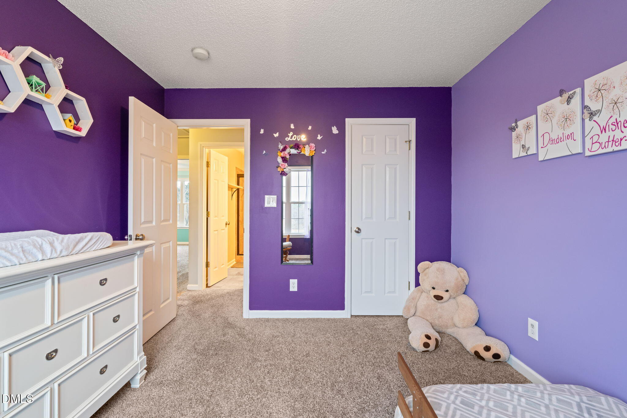 16 Saddle Ridge Drive Willow Spring, NC 27592 - Photo 33 of 57 a bedroom with a bed and a dresser