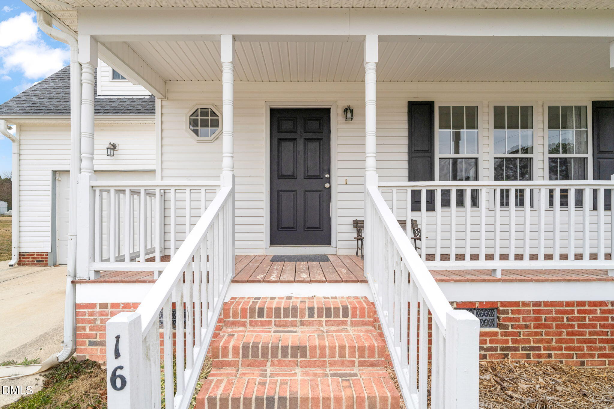 16 Saddle Ridge Drive Willow Spring, NC 27592 - Photo 4 of 57 a view of a balcony with wooden floor
