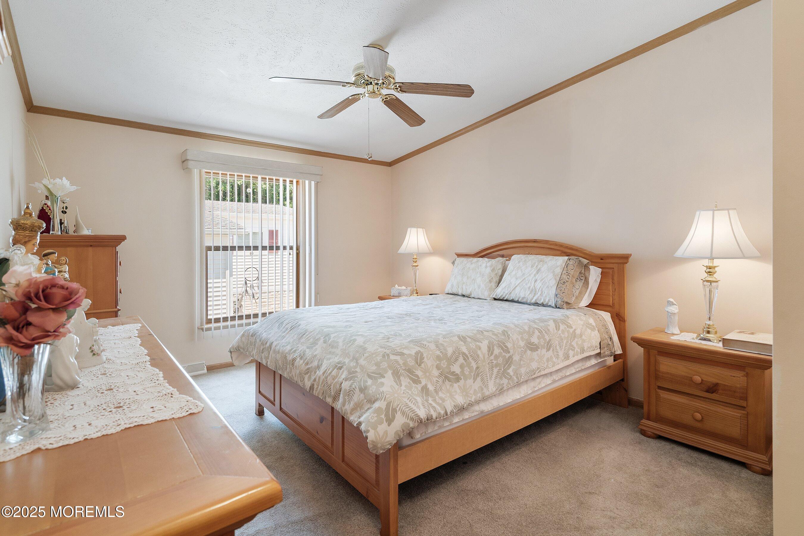1104 Sycamore Court Whiting, NJ 08759 - Photo 19 of 55 a bedroom with a bed a window and dresser
