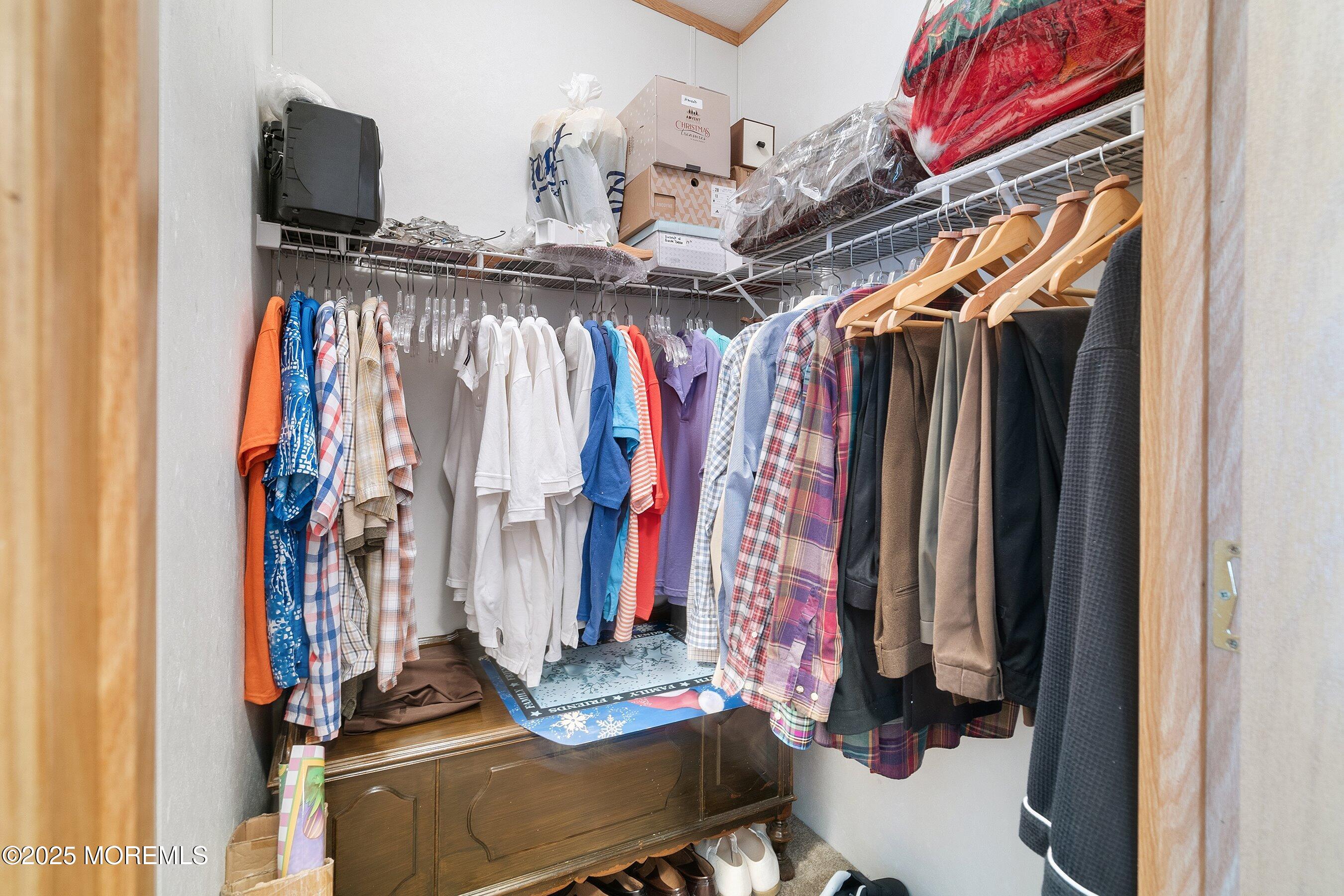 1104 Sycamore Court Whiting, NJ 08759 - Photo 21 of 55 a view of walk in closet with clothes