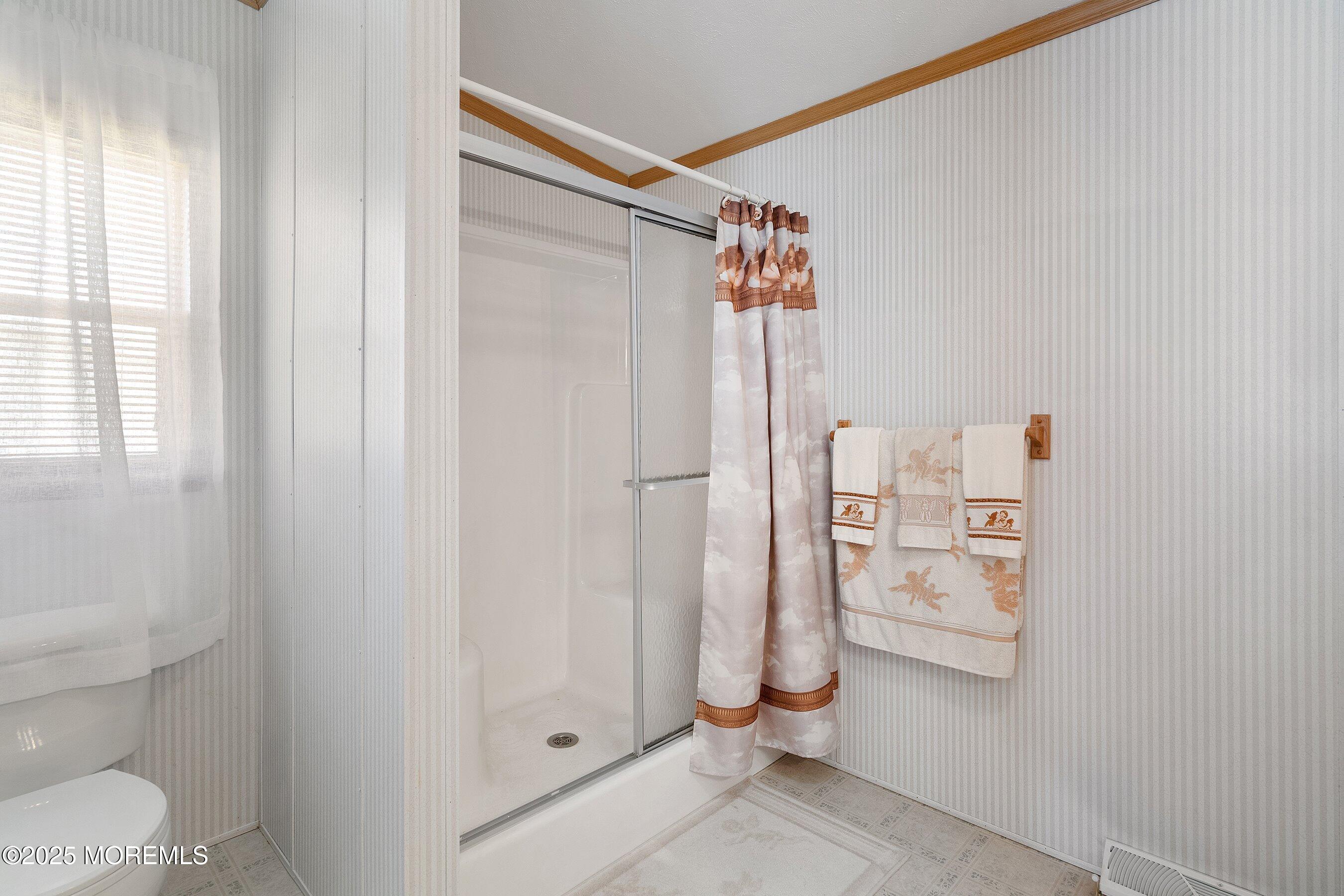 1104 Sycamore Court Whiting, NJ 08759 - Photo 23 of 55 a bathroom with a shower and a toilet