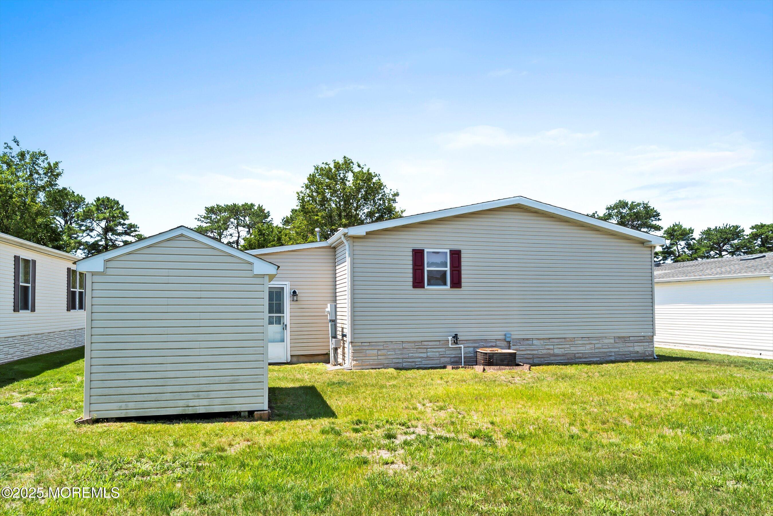 1104 Sycamore Court Whiting, NJ 08759 - Photo 28 of 55 a view of a backyard