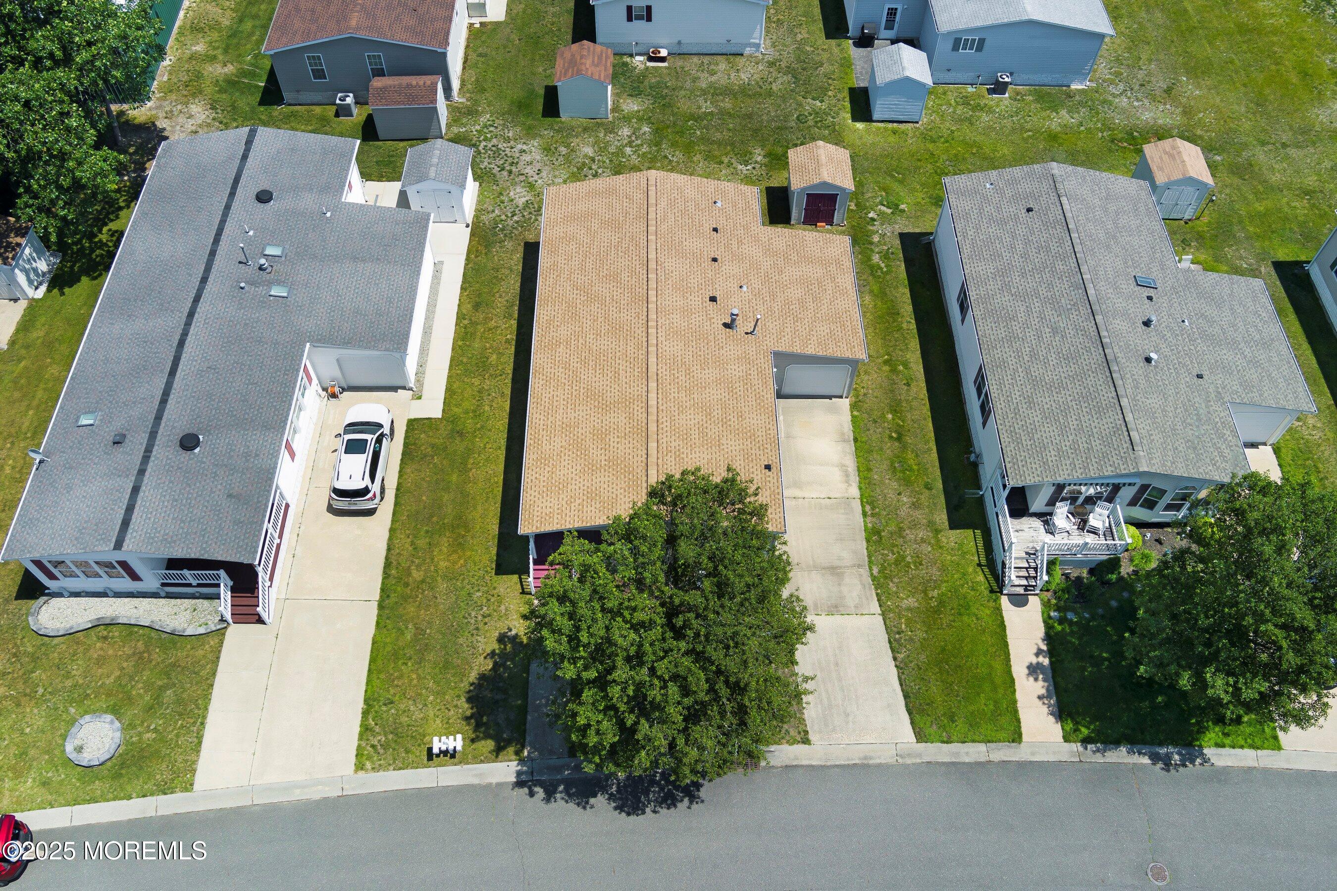 1104 Sycamore Court Whiting, NJ 08759 - Photo 6 of 55 an aerial view of residential houses with outdoor space