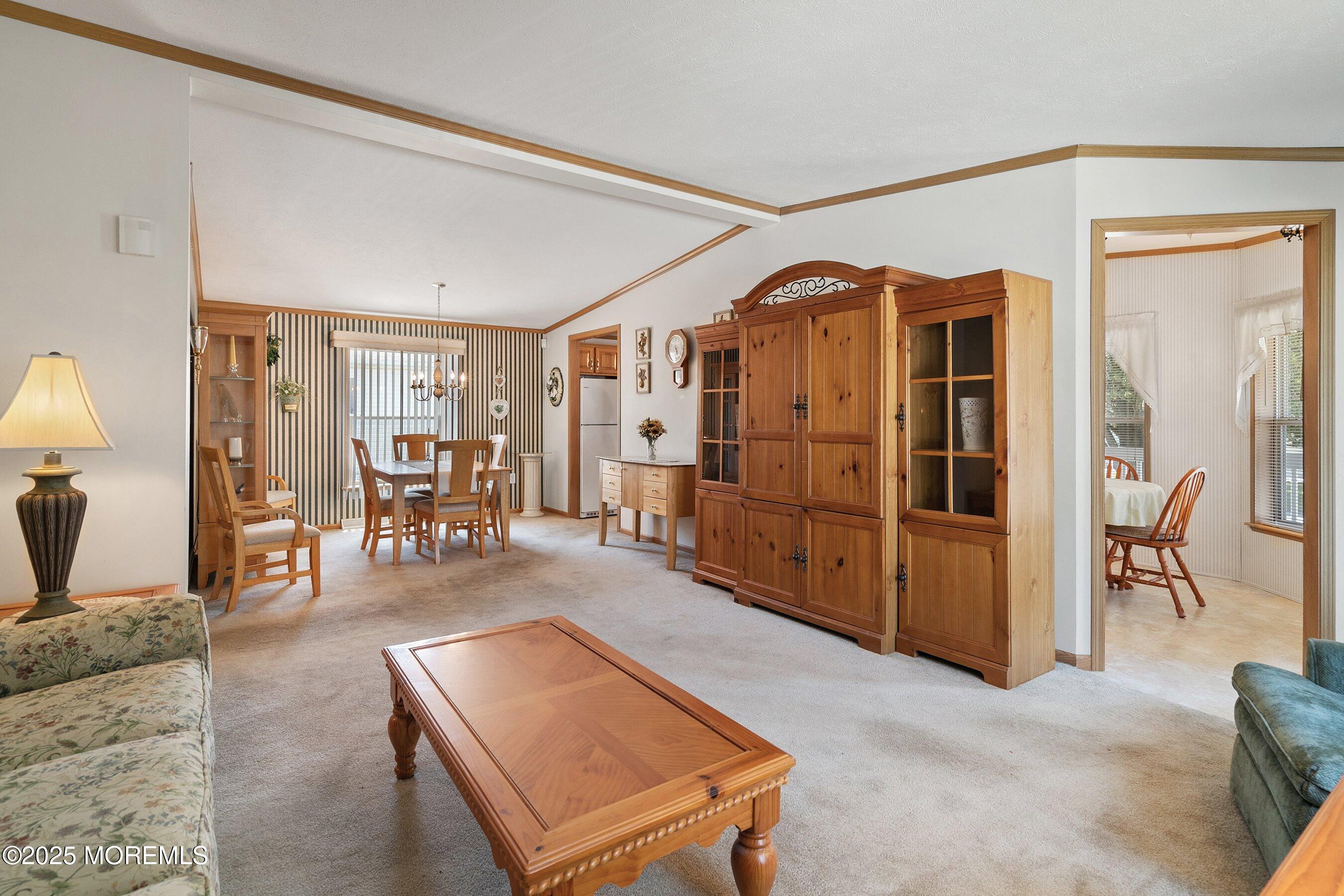 1104 Sycamore Court Whiting, NJ 08759 - Photo 10 of 55 a living room with furniture a dining table with wooden floor