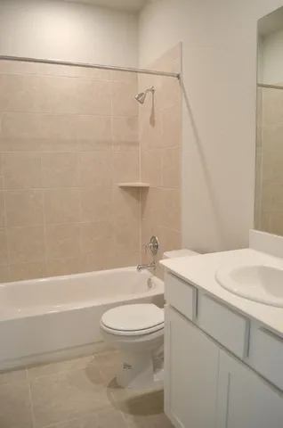 a bathroom with a sink a toilet and a bathtub