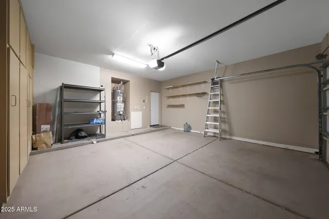 a view of an empty room with a fireplace