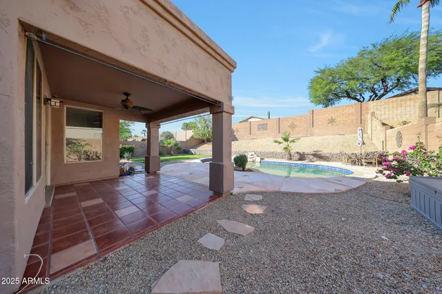 a view of a backyard with garden