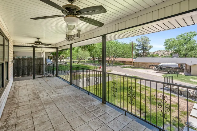 a view of a pathway with a balcony