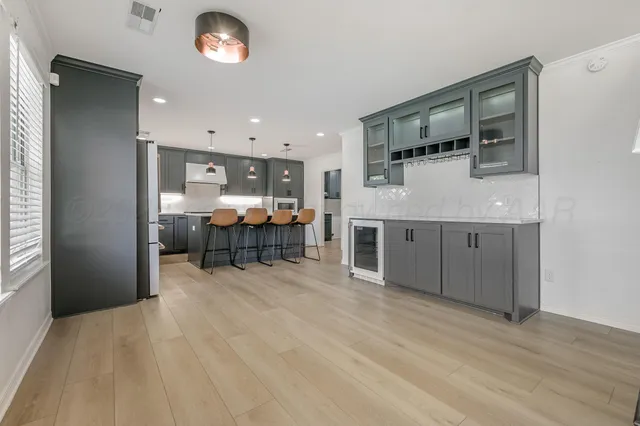 a room with furniture and a flat screen tv