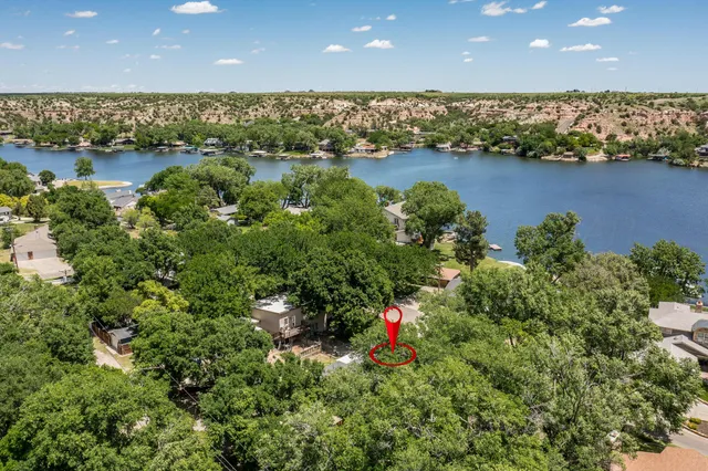 a view of a lake with a outdoor space