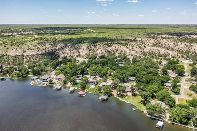 a view of a street with an ocean view