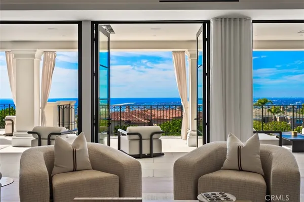 a dining room with furniture window and wooden floor
