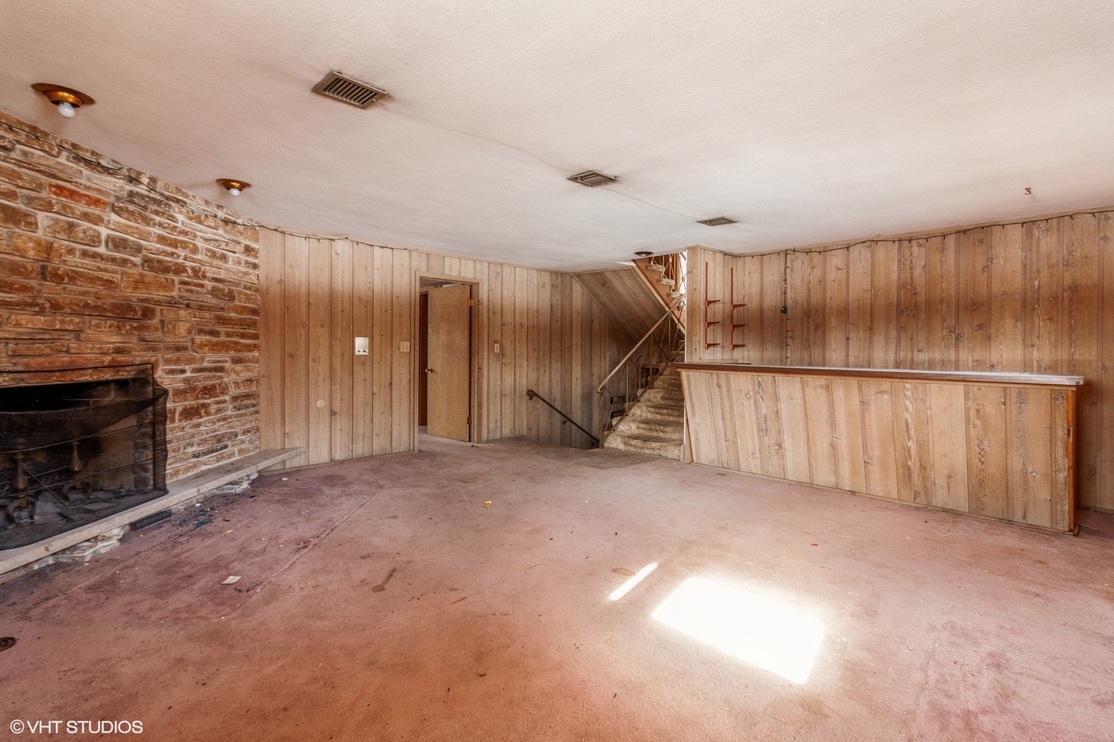 3412 York Road Oak Brook, IL 60523 - Photo 11 of 19 a view of an empty room with a fireplace