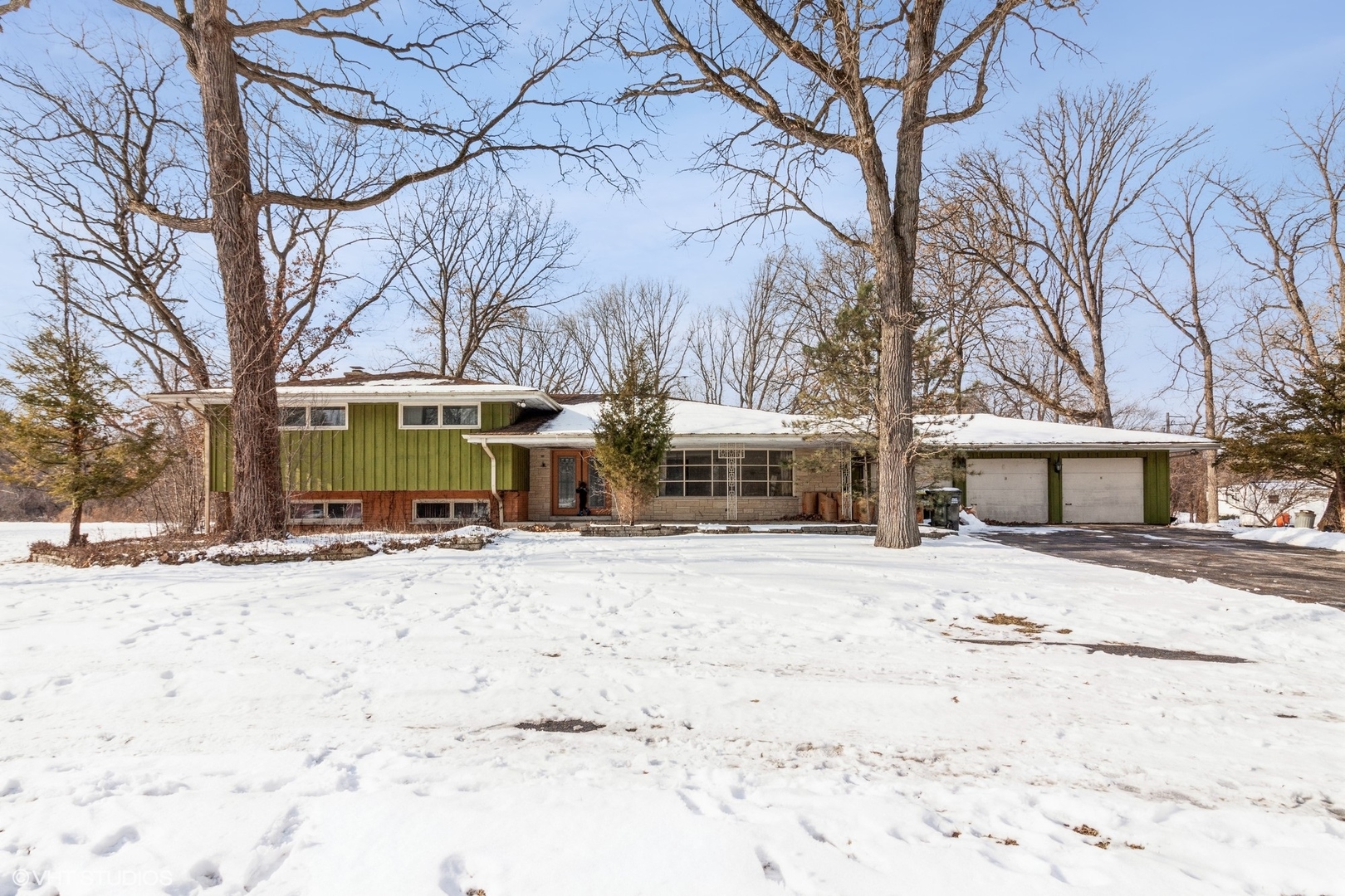 3412 York Road Oak Brook, IL 60523 - Photo 12 of 19 a view of a city with snow on the road