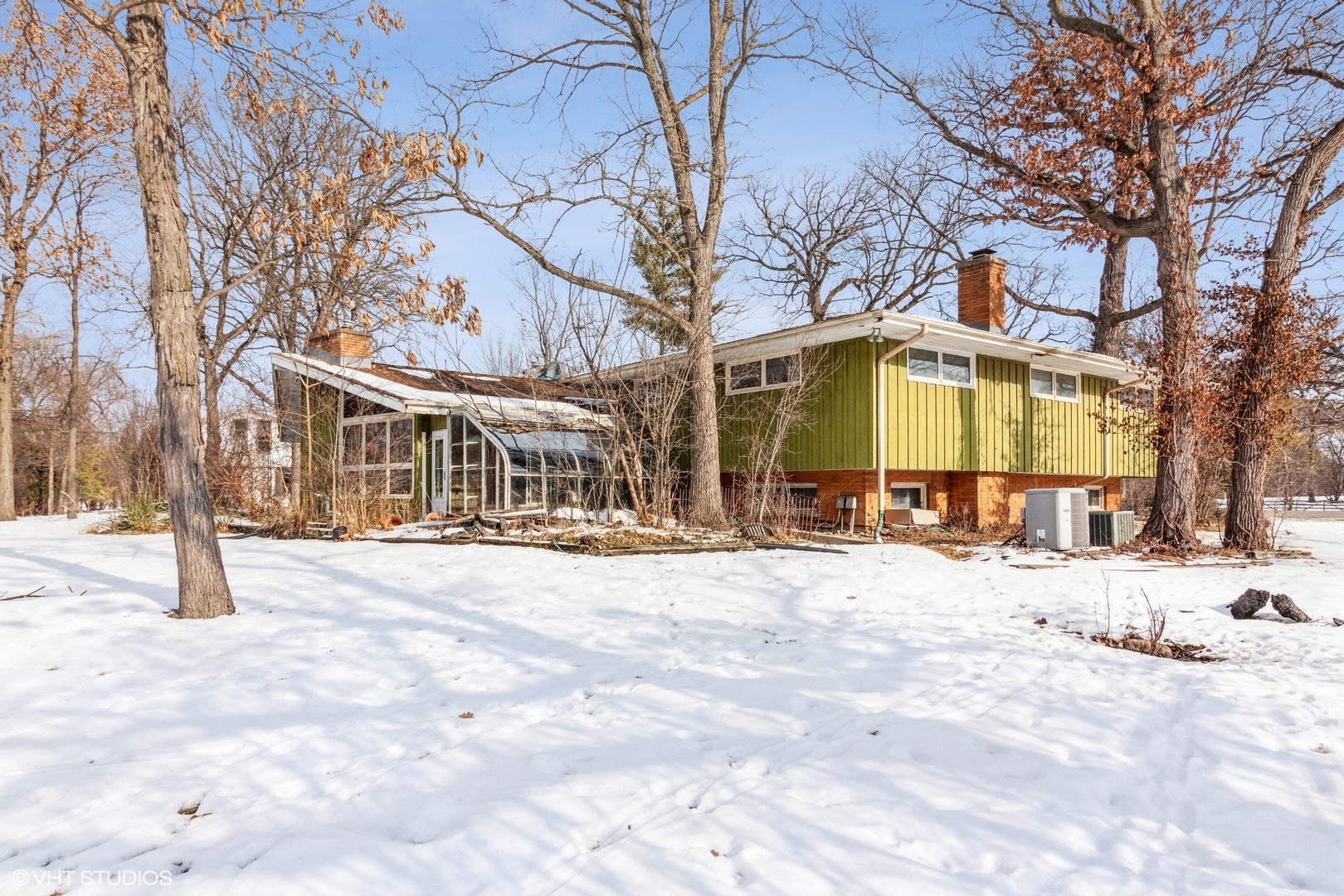 3412 York Road Oak Brook, IL 60523 - Photo 3 of 19 a view of a building with snow on the road