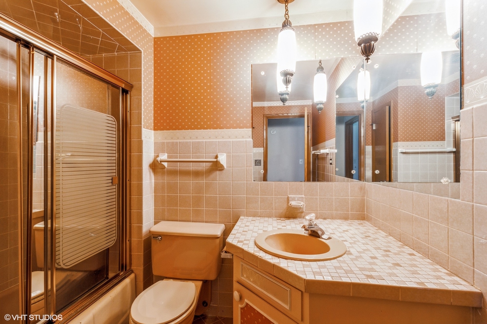 3412 York Road Oak Brook, IL 60523 - Photo 8 of 19 a bathroom with a sink toilet and shower