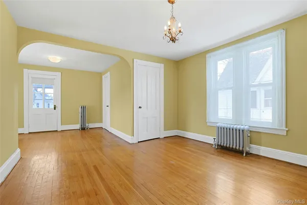 a view of livingroom with wooden floor