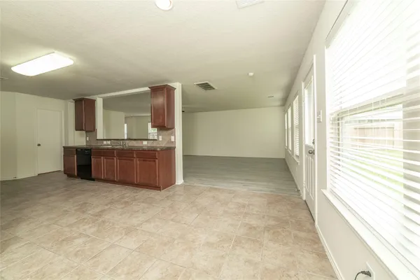 a view of a kitchen with a sink