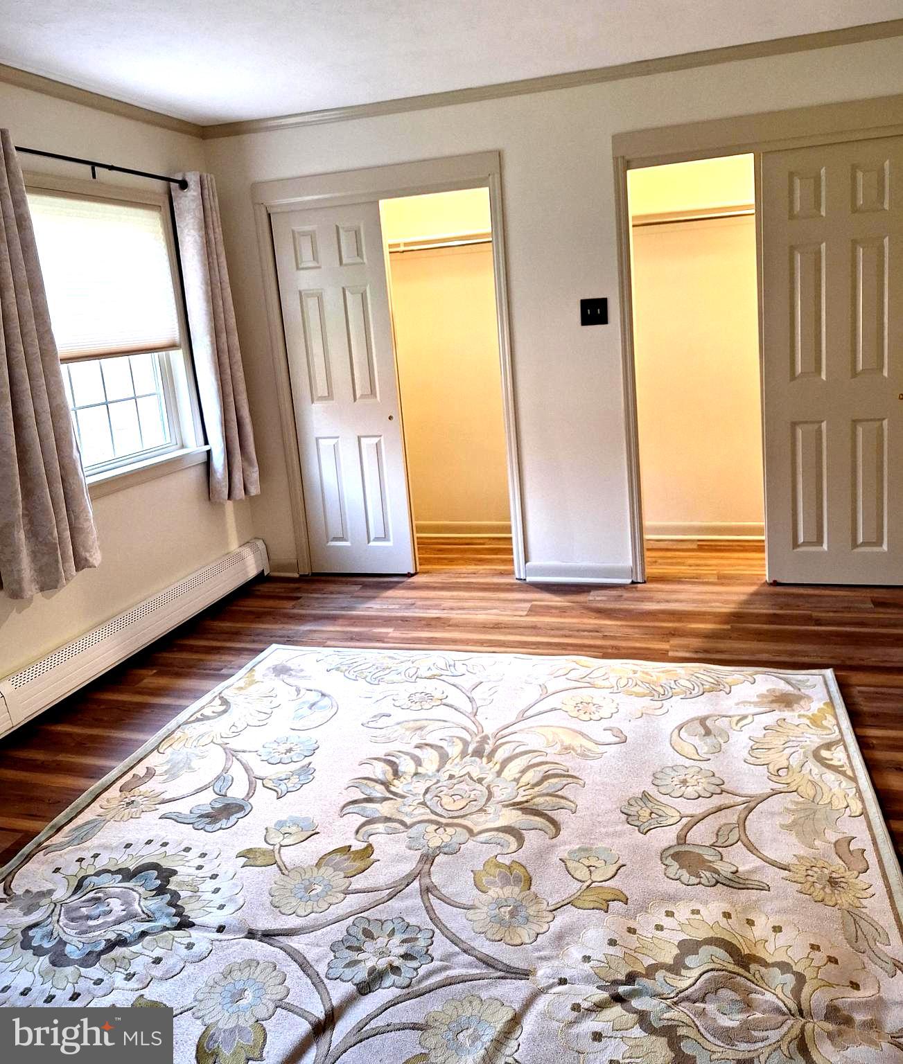 1951 Conestoga Road, Unit 2 Chester Springs, PA 19425 - Photo 16 of 22 a view of a room with wooden floor and windows
