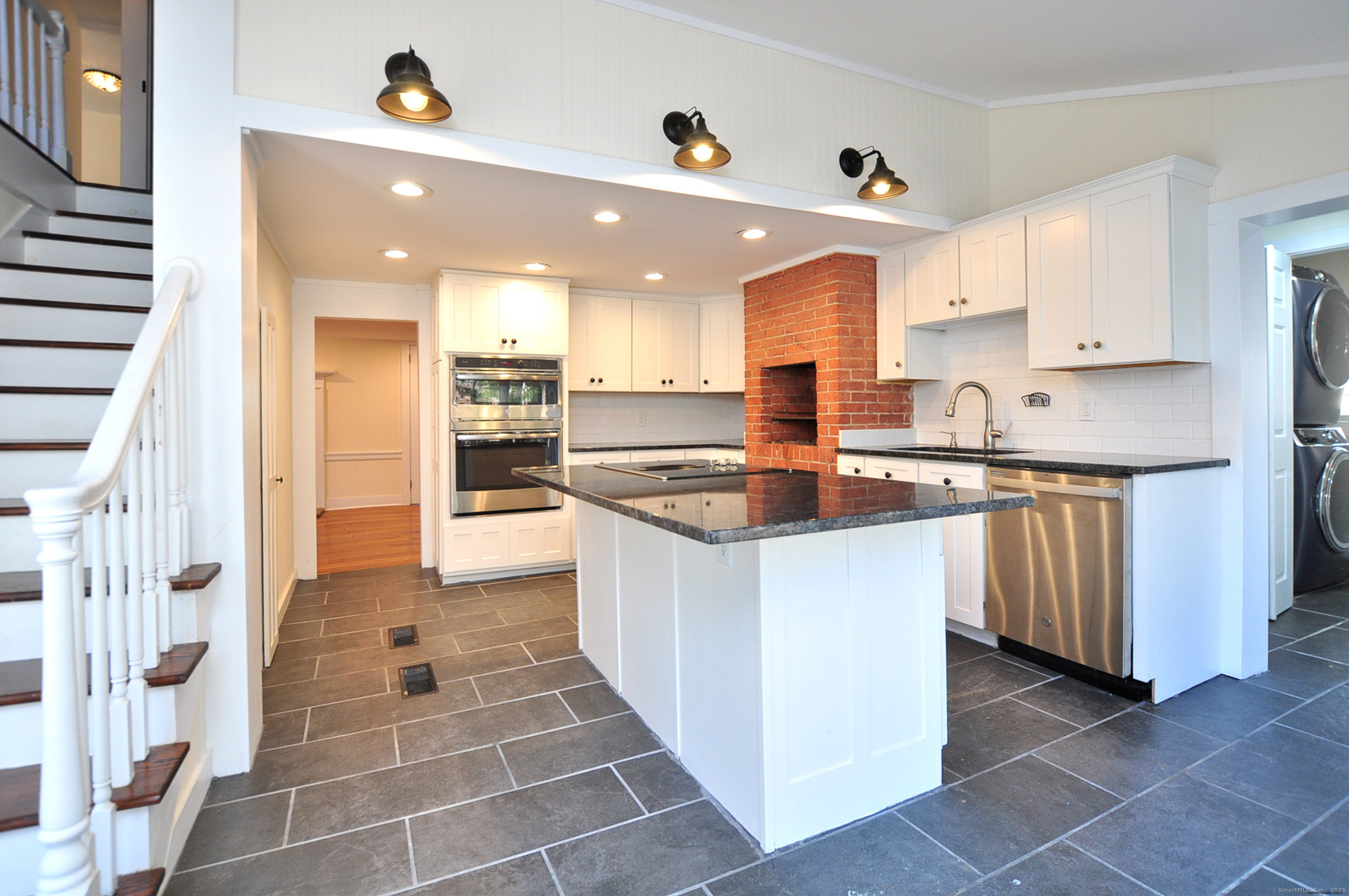 11 West Chestnut Hill Road Litchfield, CT 06759 - Photo 21 of 39 a kitchen with stainless steel appliances granite countertop a sink and cabinets