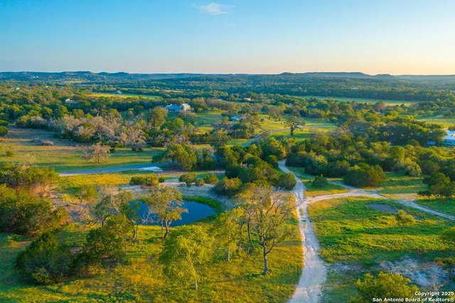 a view of lake with mountain in the background
