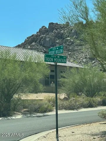 a view of a wooden fence