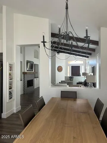 a living room with furniture and flat screen tv