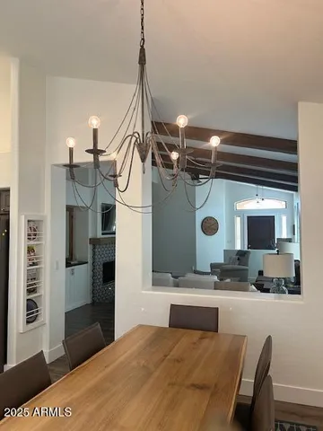 a bathroom with a sink a mirror and shower