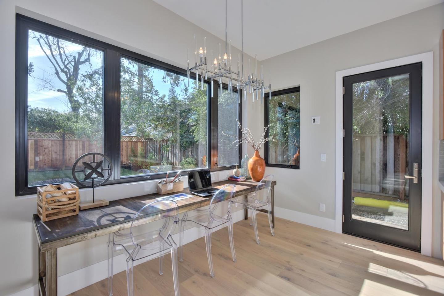 978 Covington Road Los Altos, CA 94024 - Photo 16 of 39 a dining room with furniture and large windows