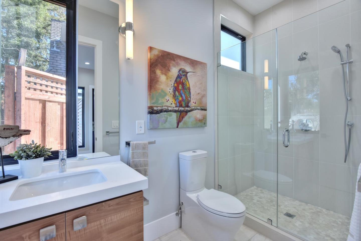 978 Covington Road Los Altos, CA 94024 - Photo 29 of 39 a bathroom with a sink a toilet and shower