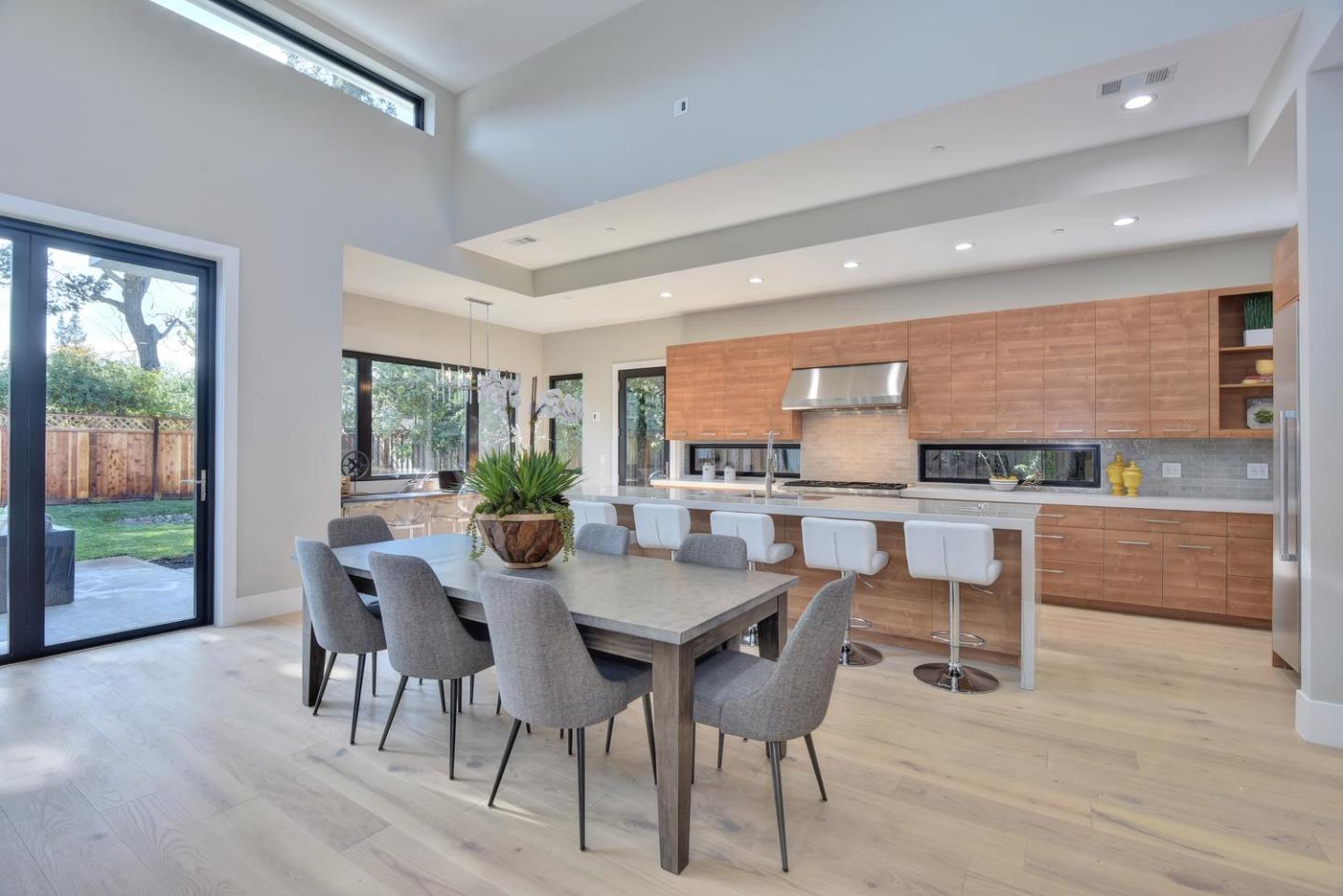 978 Covington Road Los Altos, CA 94024 - Photo 10 of 39 a view of a dining room with furniture and wooden floor