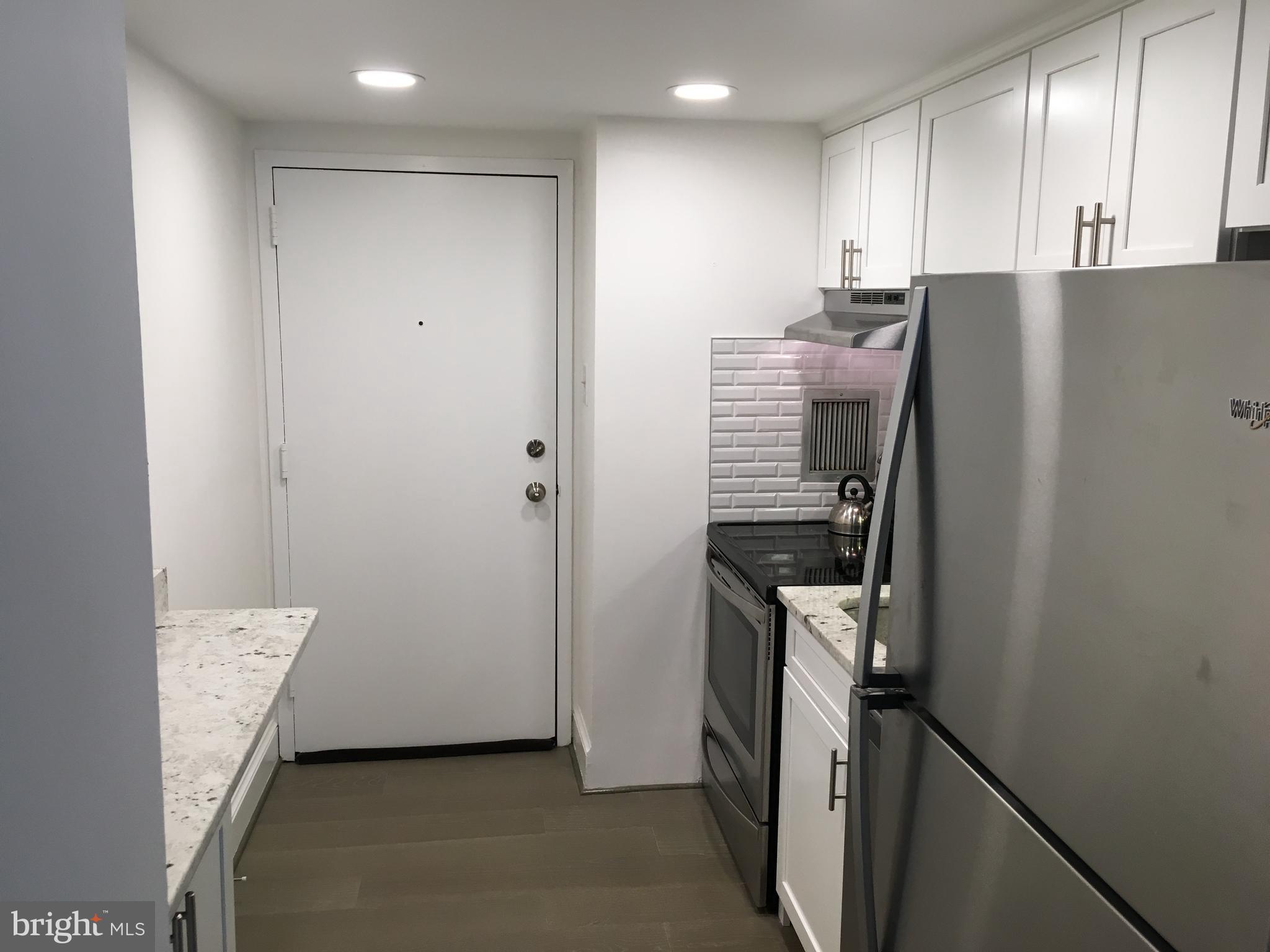 1825 T Street Northwest, Unit 303 Washington, DC 20009 - Photo 3 of 16 Bright, modern kitchen