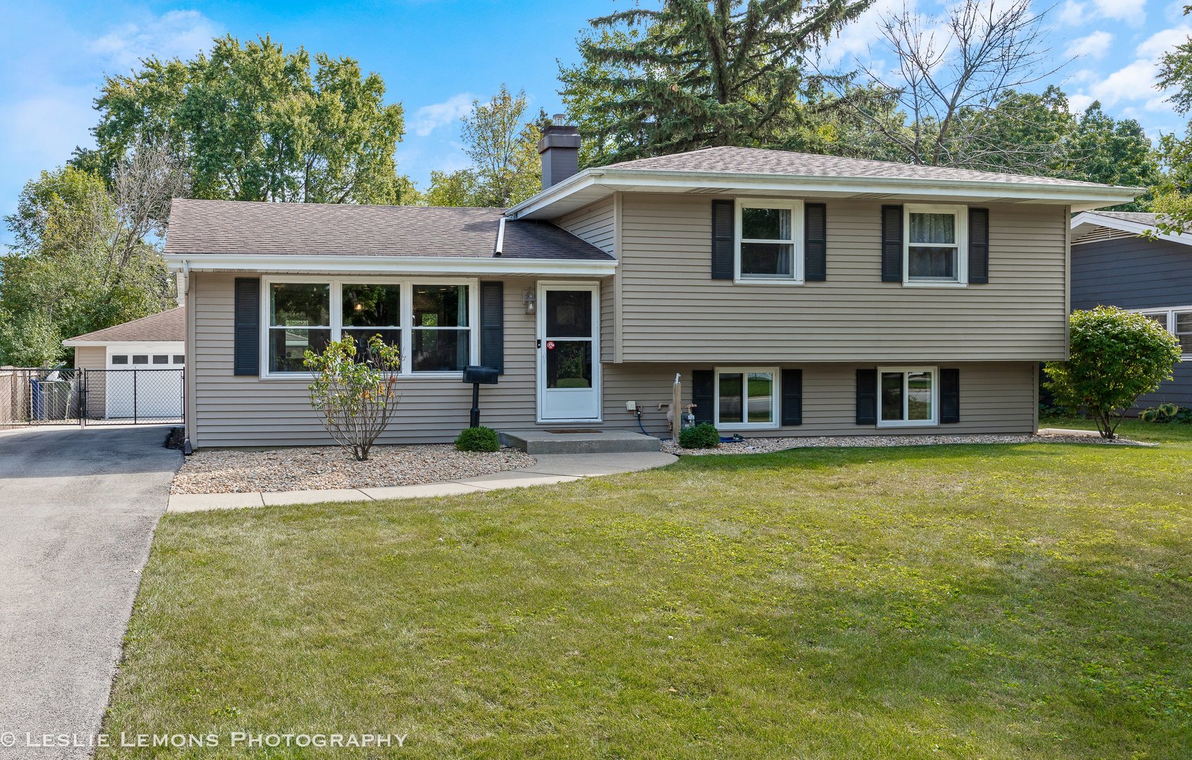 132 Robin Hill Drive Naperville, IL 60540 - Photo 1 of 29 a view of a house with a yard and sitting area