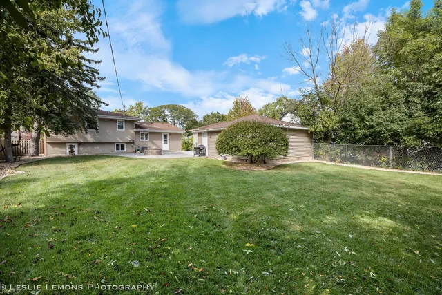 a view of a backyard with garden