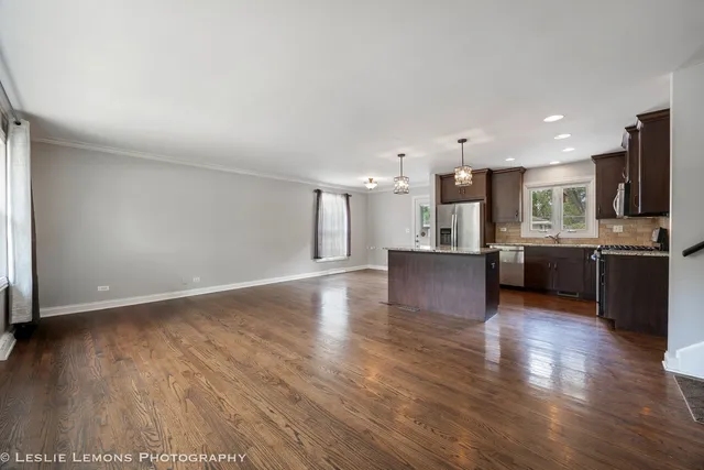 a view of kitchen with wooden floor