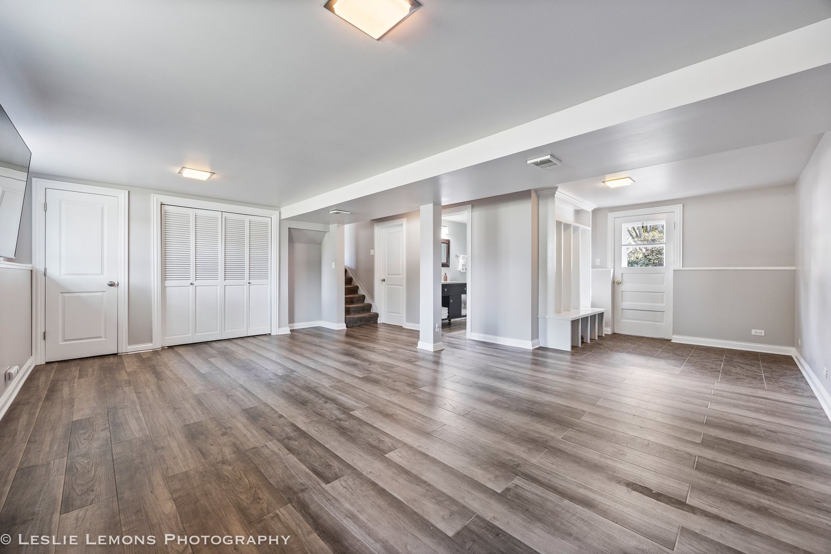 132 Robin Hill Drive Naperville, IL 60540 - Photo 23 of 29 a view of empty room with wooden floor