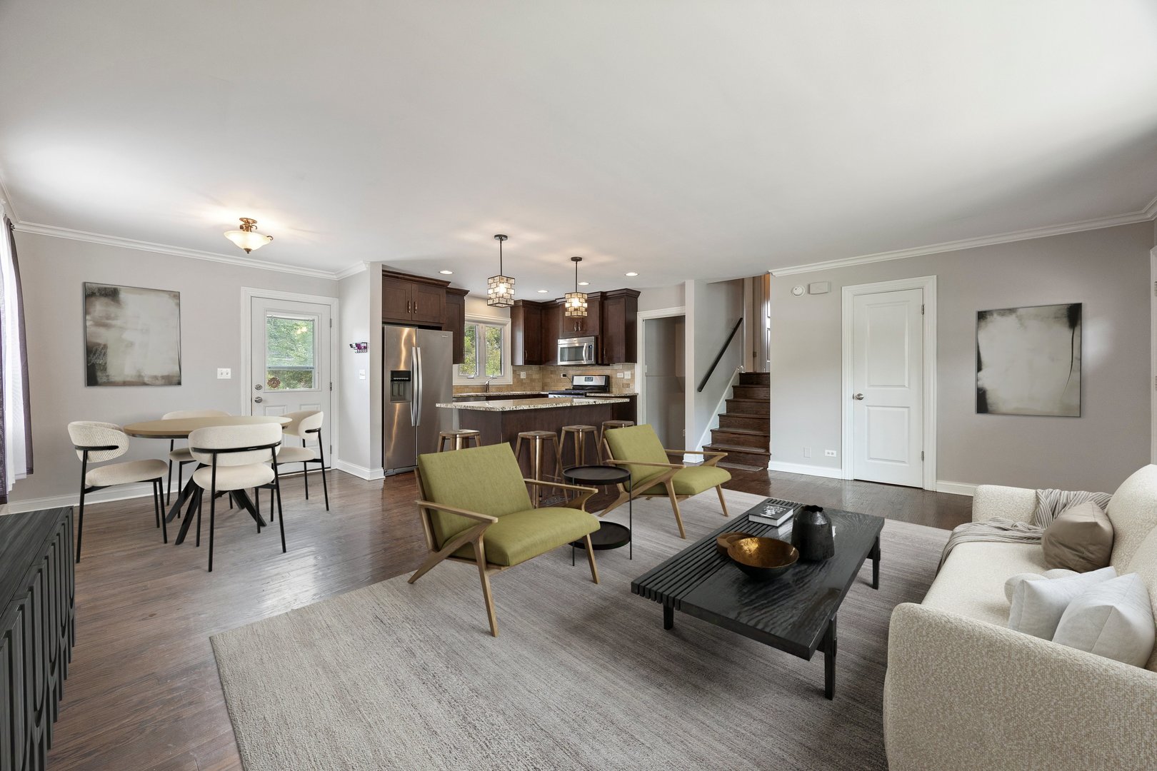 132 Robin Hill Drive Naperville, IL 60540 - Photo 3 of 29 a living room with furniture and a dining table with wooden floor
