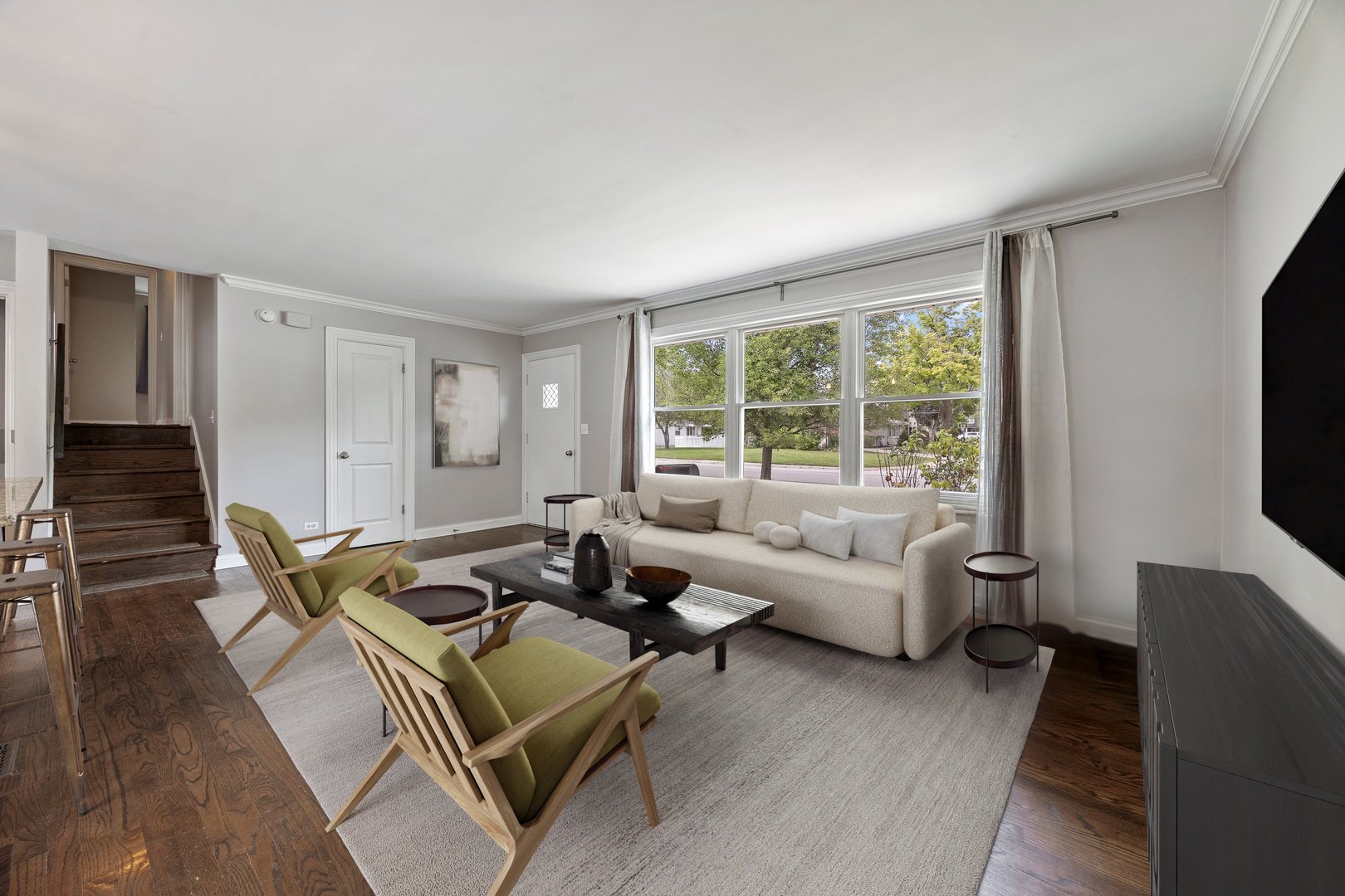 132 Robin Hill Drive Naperville, IL 60540 - Photo 4 of 29 a living room with furniture and a flat screen tv