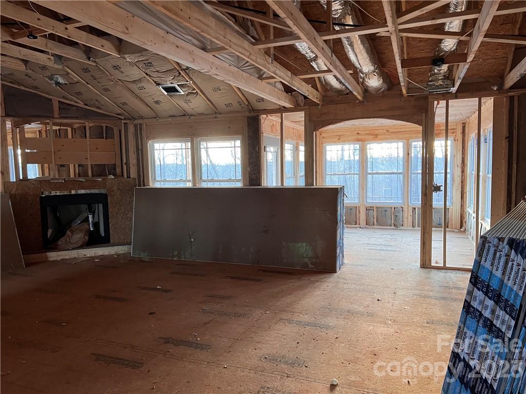 643 Cross Ridge Drive, Unit 120 Rutherfordton, NC 28139 - Photo 3 of 4 a view of an empty room with a fireplace