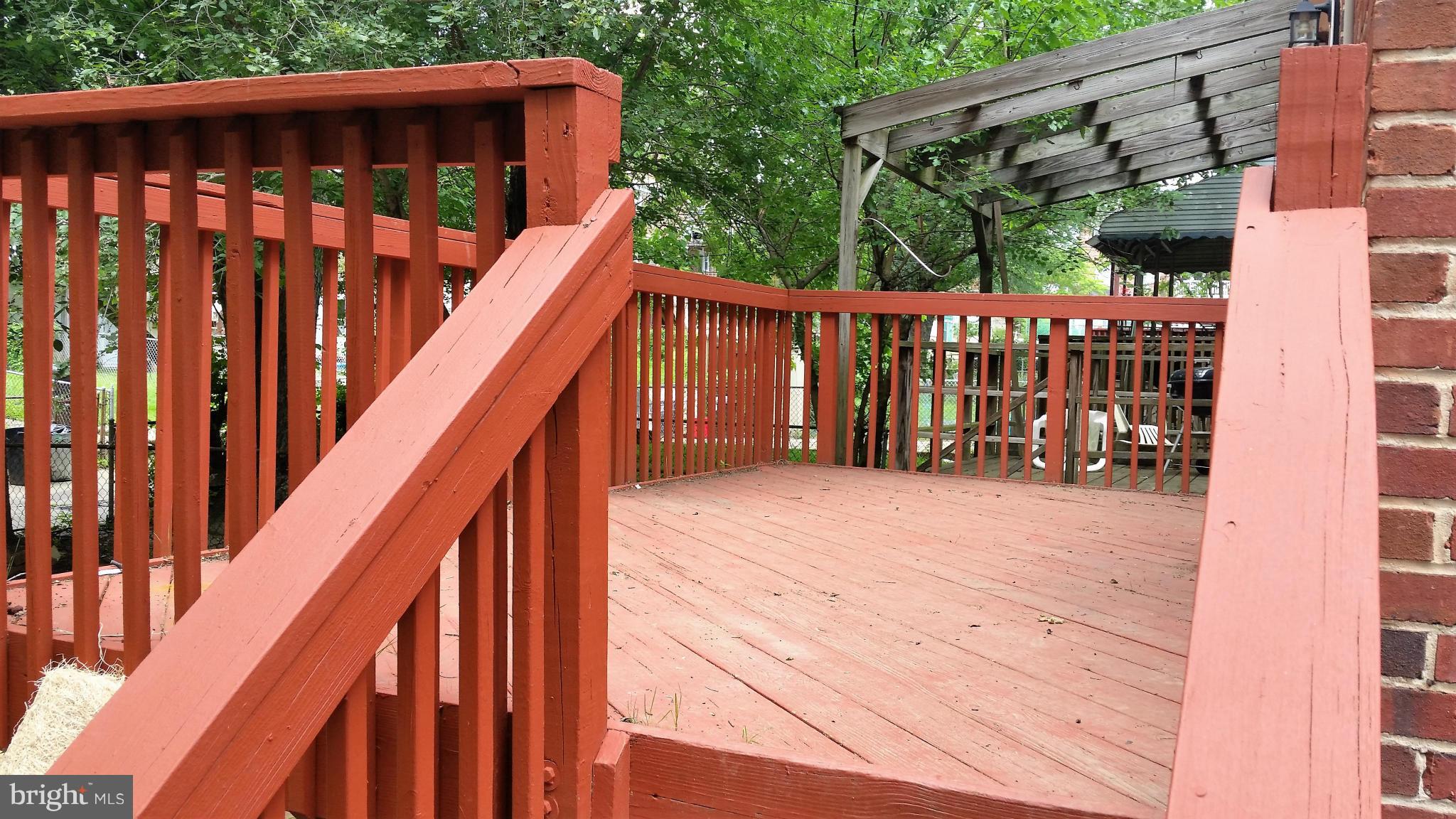 8528 Water Oak Road Baltimore, MD 21234 - Photo 22 of 30 a balcony with wooden floor and outdoor space