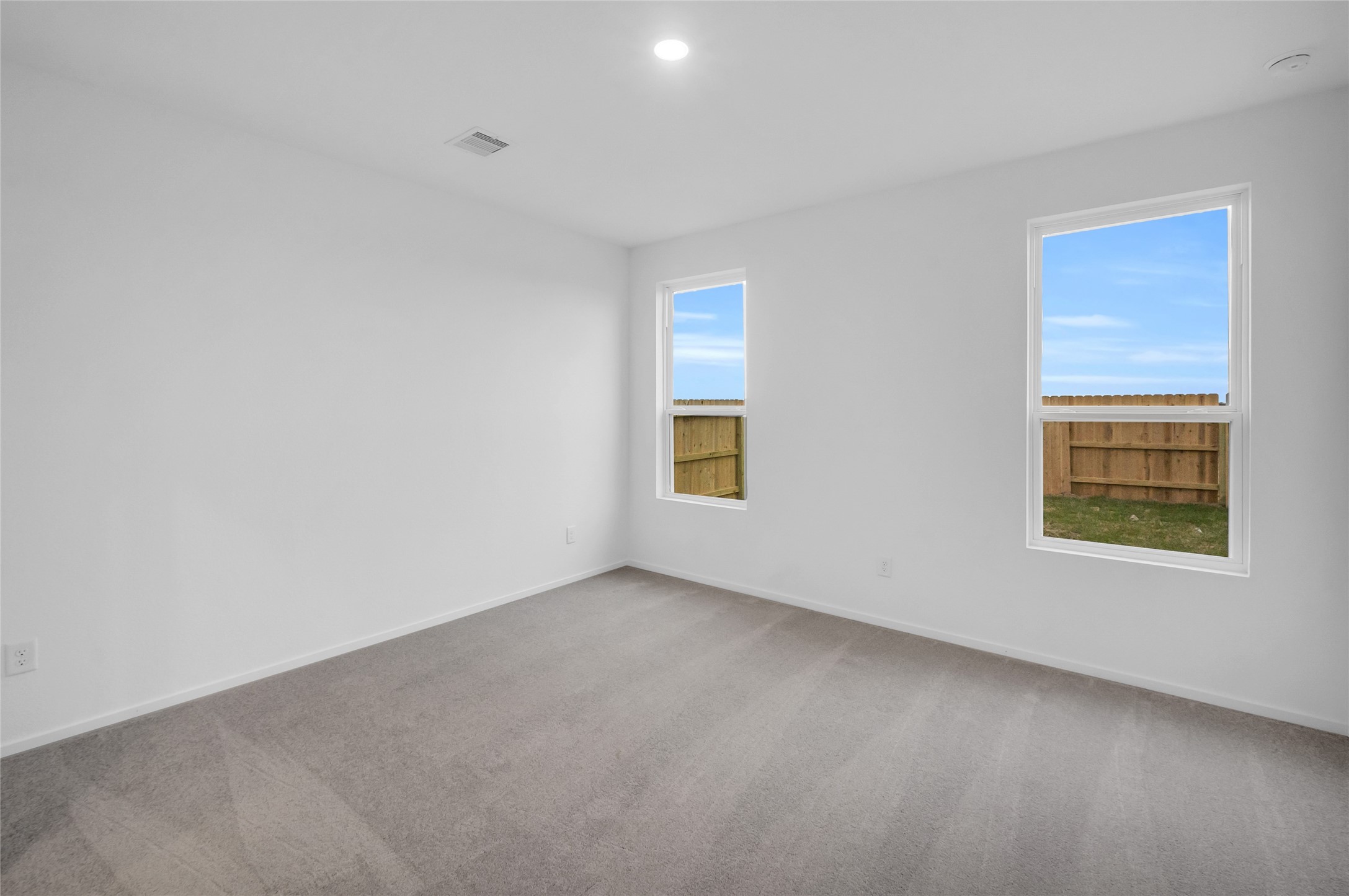 7923 Evening Emerald Drive Rosharon, TX 77583 - Photo 5 of 28 an empty room with a window