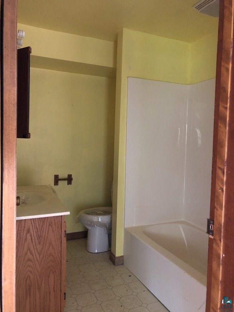 75198 Eichmann Road Glidden, WI 54527 - Photo 12 of 44 Bathroom accessed from kitchen