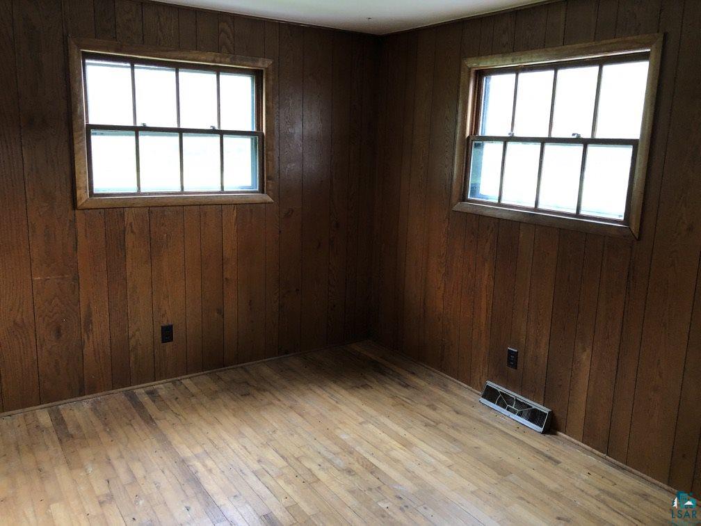 75198 Eichmann Road Glidden, WI 54527 - Photo 14 of 44 Hardwood floors in first bedroom