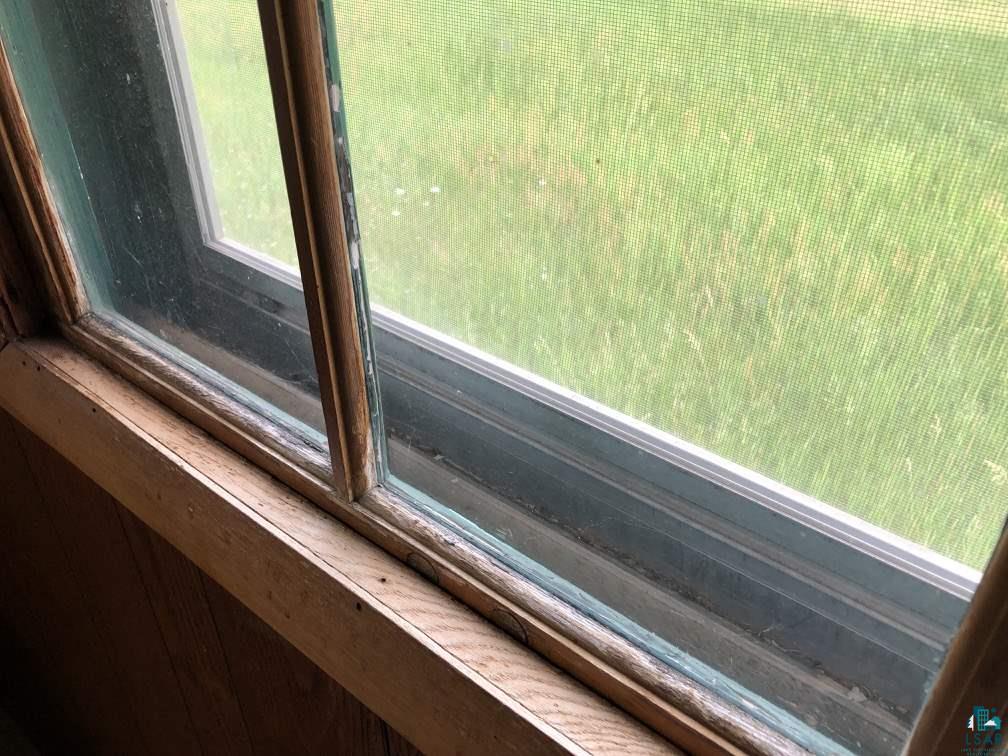 75198 Eichmann Road Glidden, WI 54527 - Photo 17 of 44 Wood framed windows with storm windows.