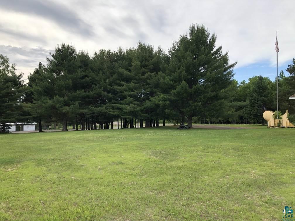 75198 Eichmann Road Glidden, WI 54527 - Photo 8 of 44 Lake is approximately 200 feet away across the lawn - no road between house and lake.